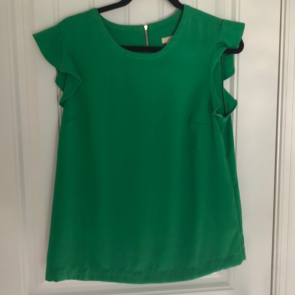 Green top with ruffle sleeves